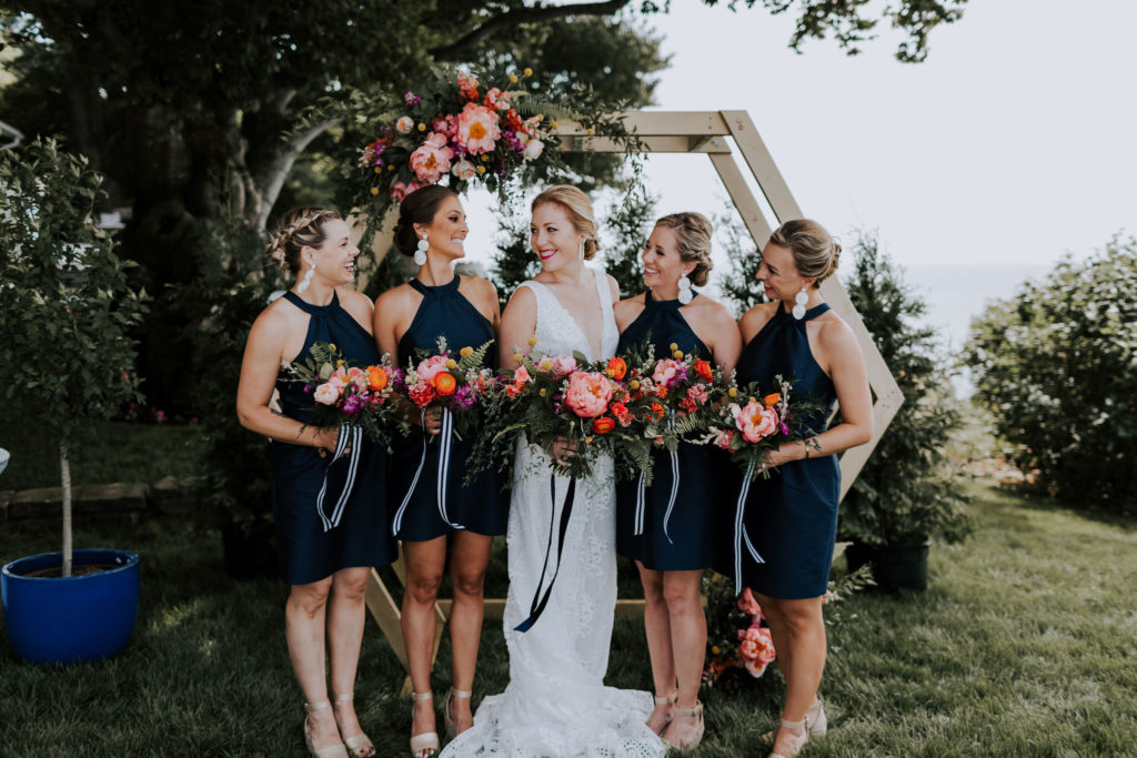 Bridesmaids in navy dresses
