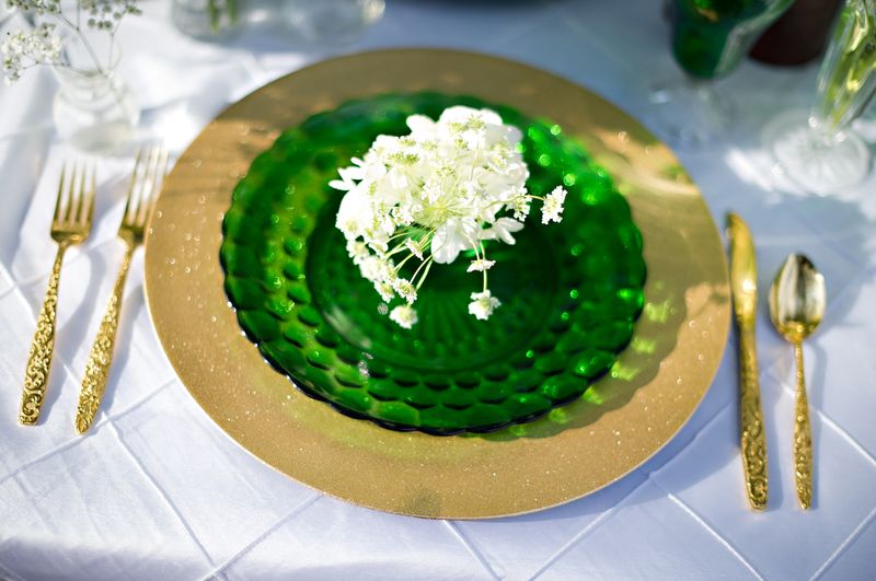 Gold and green place setting